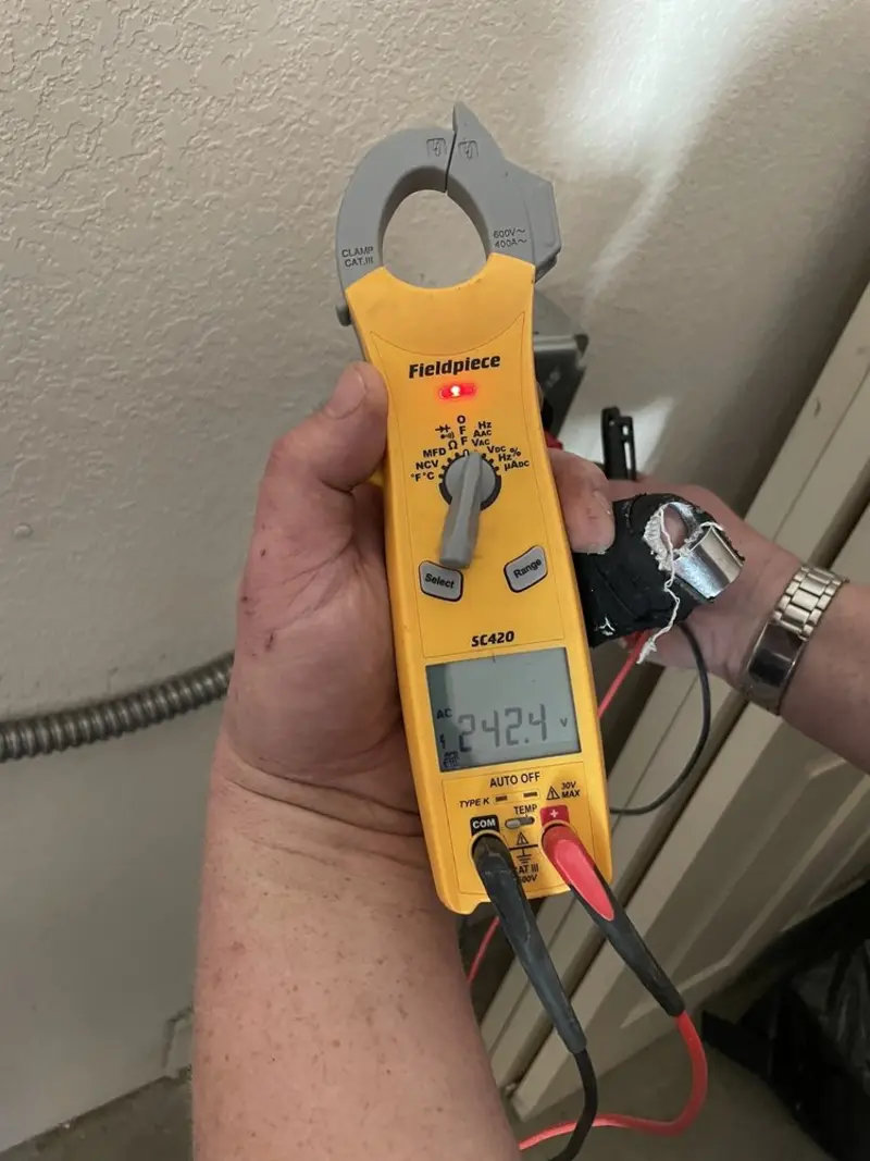 Voltage testing with clamp meter during Generator Installation in Nolensville
